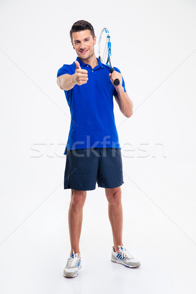 Férfi tart teniszütő mutat hüvelykujj felfelé Stock fotó © deandrobot
