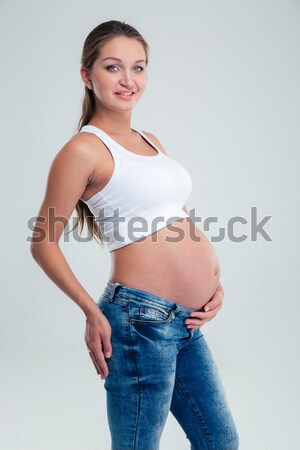 Portret femeie gravida ruleta izolat alb fericit Imagine de stoc © deandrobot