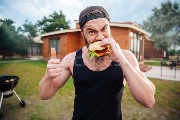 [[stock_photo]]: Guy · délicieux · Burger