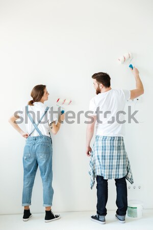 Back view of couple making repair Stock photo © deandrobot