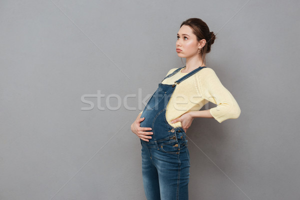 Bored pregnant woman Stock photo © deandrobot