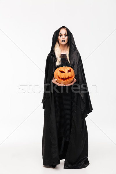 Full length portrait of a blonde woman in halloween make-up Stock photo © deandrobot