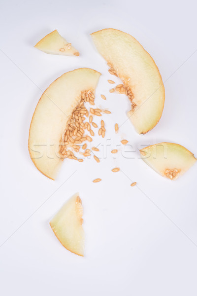 Erschossen Scheiben Melone Steine Stücke gelb Stock foto © deandrobot