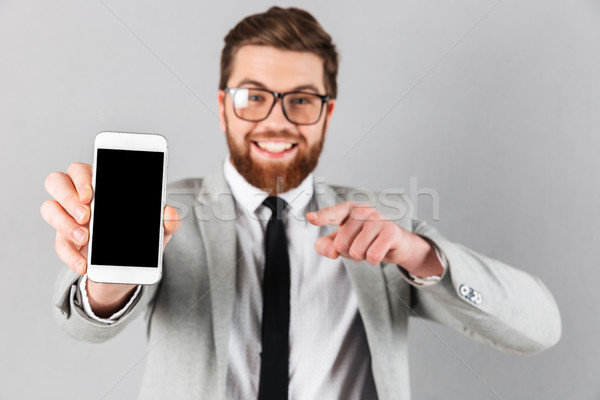 Close up portrait of a happy businessman Stock photo © deandrobot