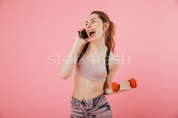 Lachen Sportlerin sprechen Smartphone Ausübung Stock foto © deandrobot