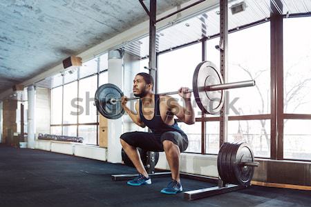 Muskuläre Mann Training Langhantel Porträt Stock foto © deandrobot