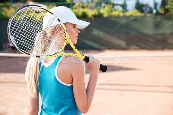 Vista posterior tenis mujer tribunal cohete deportes Foto stock © deandrobot