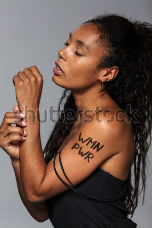 [[stock_photo]]: Concentré · jeunes · africaine · séance · photo