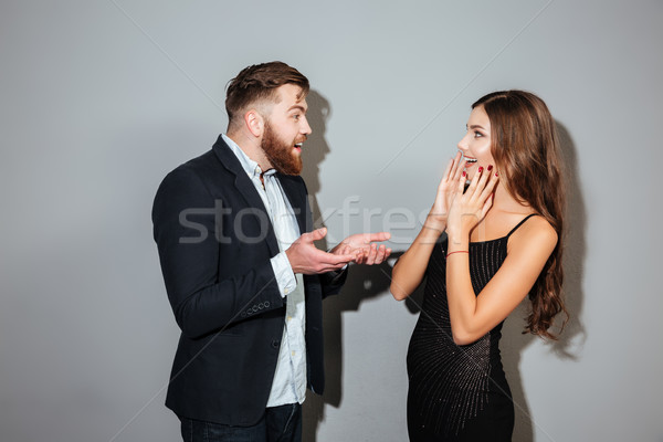 Jovem atraente casal inteligente roupa menina Foto stock © deandrobot