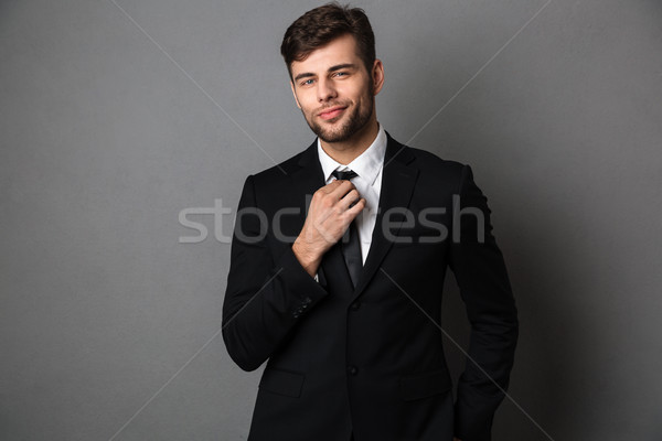 Jovem atraente homem clássico terno amarrar Foto stock © deandrobot