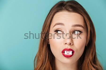 Portrait of a satisfied brown haired woman Stock photo © deandrobot