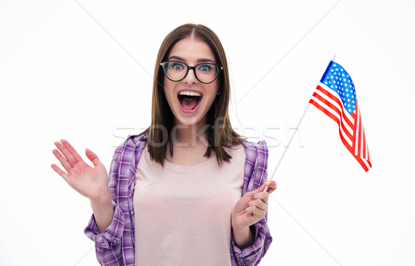 Surprised young woman with US flag Stock photo © deandrobot