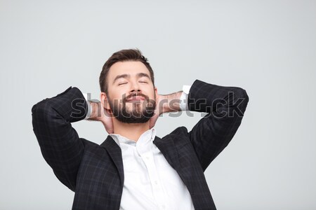 Businessman fighting over gray background Stock photo © deandrobot