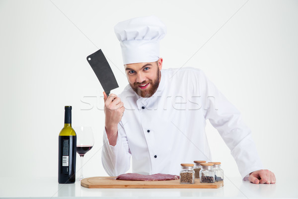 Portrait of a happy male chef cook preparing meat  Stock photo © deandrobot