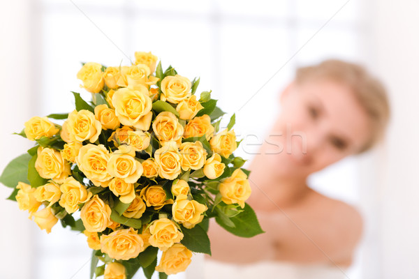 Bride holding flowers Stock photo © deandrobot