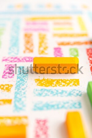 Close up photo of pastels chalks on colorful background Stock photo © deandrobot