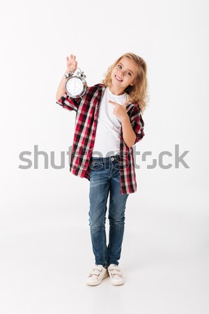 Full length portrait of a happy little girl Stock photo © deandrobot