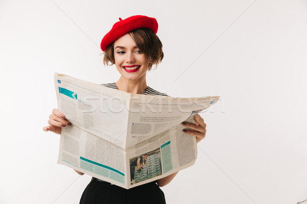 Portret uśmiechnięta kobieta czerwony beret czytania Zdjęcia stock © deandrobot