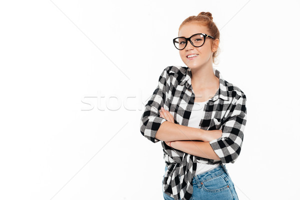 улыбаясь имбирь женщину рубашку позируют оружия Сток-фото © deandrobot
