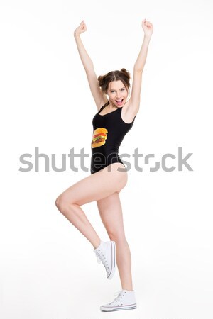 Positivo animado mulher jovem imprimir dança saltando Foto stock © deandrobot