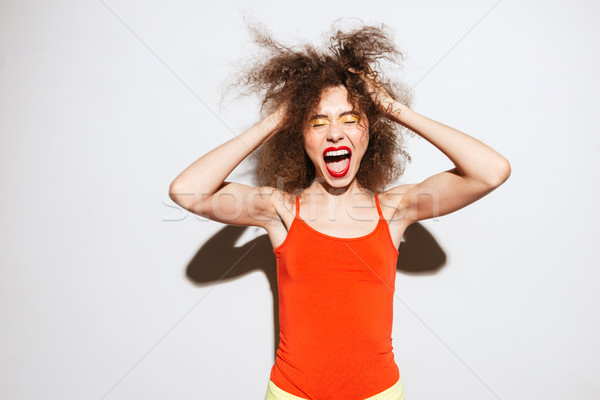 Sikít szokatlan modell tart haj csukott szemmel Stock fotó © deandrobot