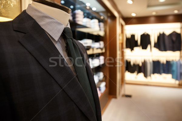 Close up shot of man suit jacket on hanger Stock photo © deandrobot