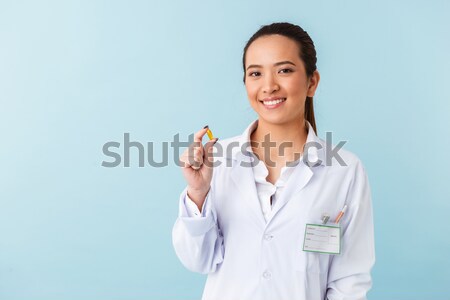 Kobieta dentysta lekarza nauczania szczotki zęby Zdjęcia stock © deandrobot