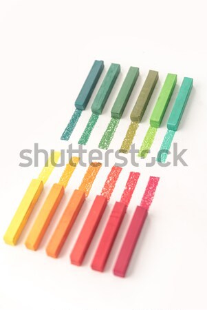 Close up view of bright colorful pastel chalks and their pigment Stock photo © deandrobot