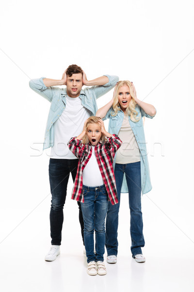 Full length portrait of a unsatisfied upset family Stock photo © deandrobot