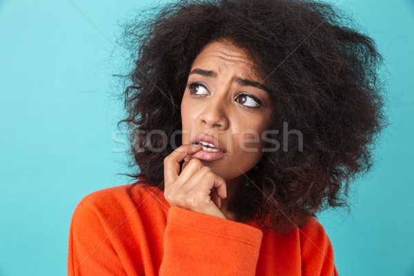 Colorful image closeup of terrified woman in red shirt looking a Stock photo © deandrobot