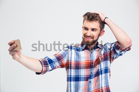 Portrait of a stressed casual man Stock photo © deandrobot