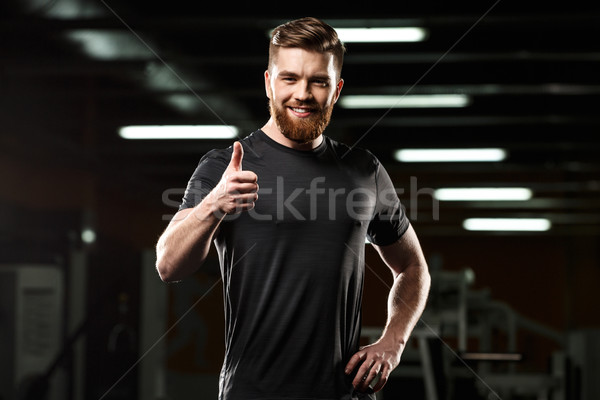 Feliz deportes hombre gesto Foto stock © deandrobot