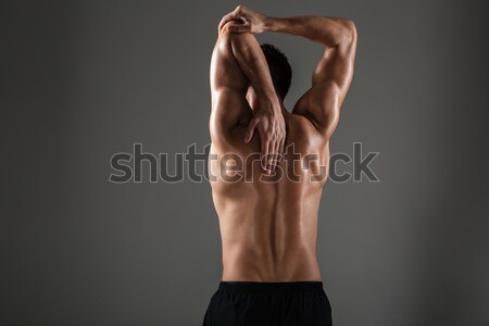 Fotó izzadt sportos férfi tökéletes test pózol Stock fotó © deandrobot