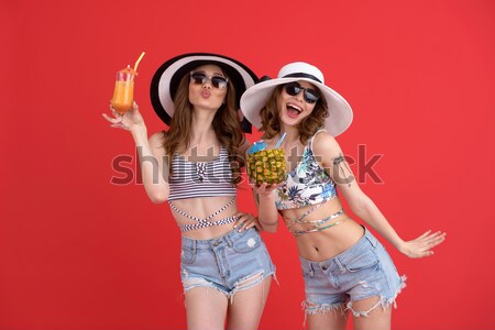 Portrait of two cheerful girls in summer clothes Stock photo © deandrobot