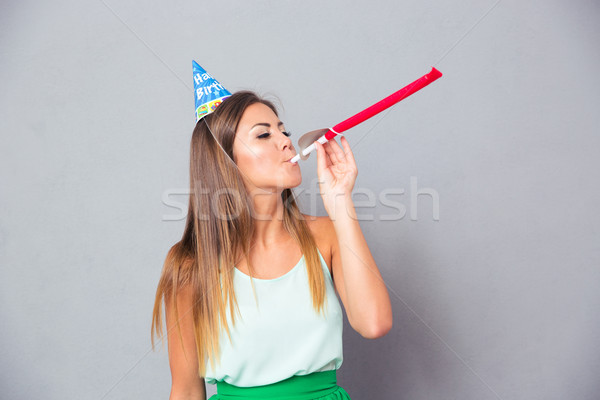 Woman blows in whistle  Stock photo © deandrobot