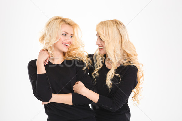 Foto stock: Dois · belo · irmãs · olhando · outro