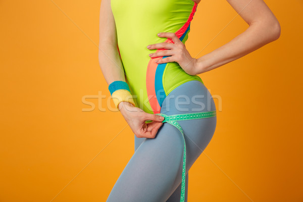 Szczupły kobieta fitness stałego żółty Zdjęcia stock © deandrobot