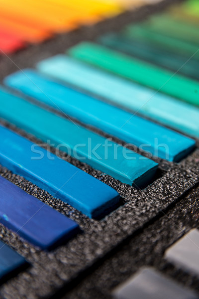 Close-up photo of new colorful chalk pastels in box Stock photo © deandrobot