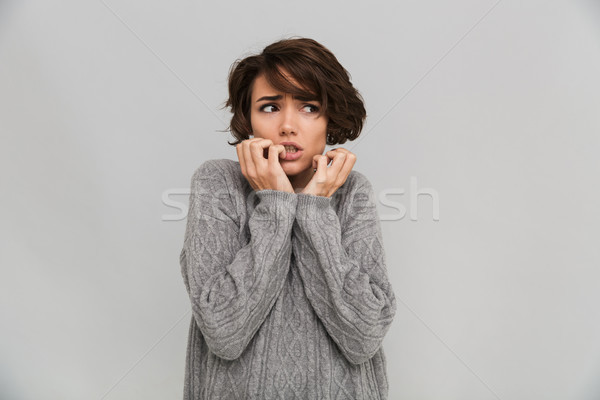 Ideges fiatal nő pulóver kép áll izolált Stock fotó © deandrobot