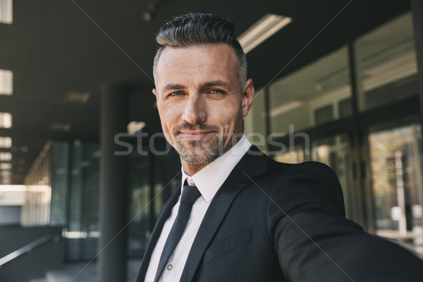 Stockfoto: Portret · glimlachend · jonge · zakenman · pak · permanente