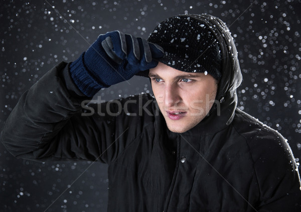 Yakışıklı adam kış bez kar yüz Stok fotoğraf © deandrobot