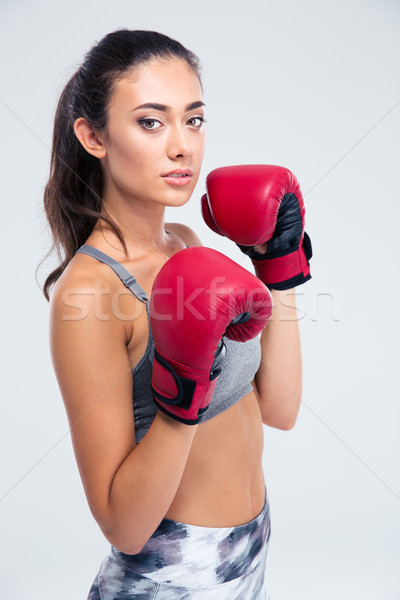 Portrait of a beautiful female boxer Stock photo © deandrobot
