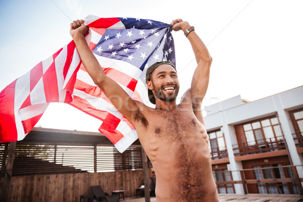 Africaine homme USA pavillon souriant afro [[stock_photo]] © deandrobot