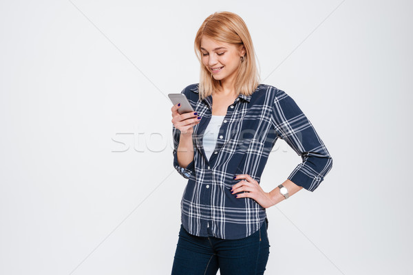 Atrakcyjny młoda kobieta telefonu obraz odizolowany Zdjęcia stock © deandrobot