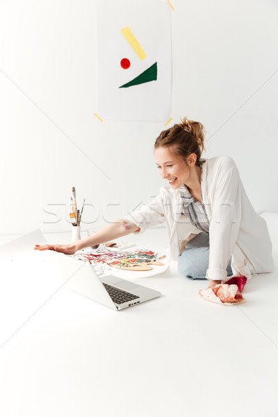 удивительный молодые кавказский Lady художника workspace Сток-фото © deandrobot