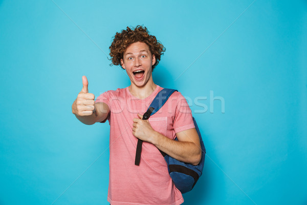 Foto Studenten guy lockiges Haar tragen Stock foto © deandrobot