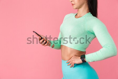 Tablet anziehend Fitness Frau sinnliche Trainingsanzug Stock foto © deandrobot
