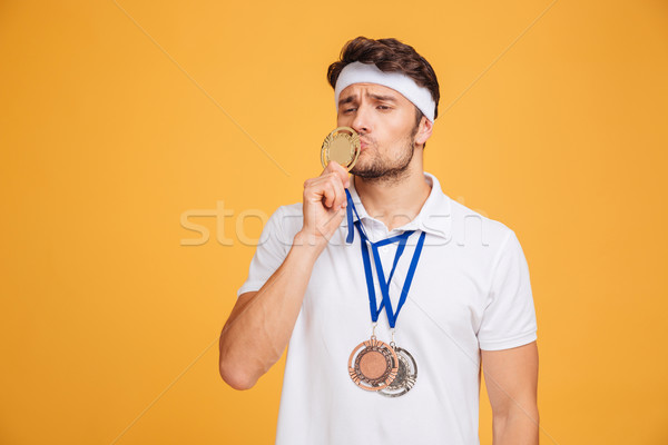 Foto stock: Retrato · funny · jóvenes · pie · besar · medalla