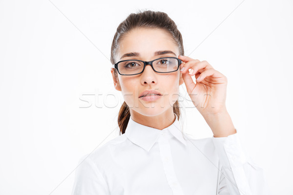 Primer plano grave hermosa jóvenes mujer de negocios gafas Foto stock © deandrobot