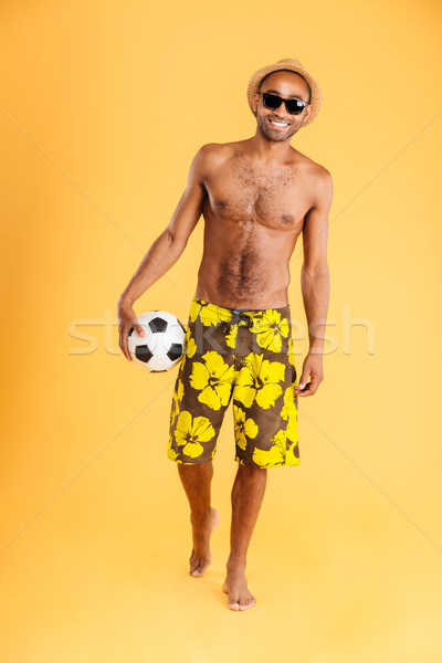 Férfi fürdőruha láb labda teljes alakos portré Stock fotó © deandrobot